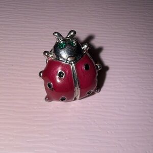 Red and Silver Ladybug Brooch with green rhinestone eyes. Good luck 🐞